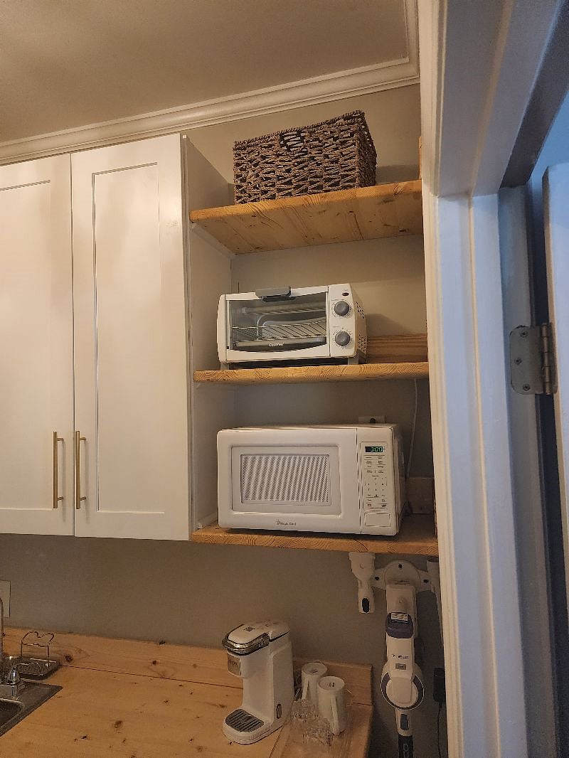 Microwave, toaster oven, single eye hot plate, air fryer, Keurig, and mini fridge