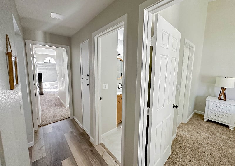Hall Way With Two Linen Closets Connecting Bedrooms, Bath & Living Area