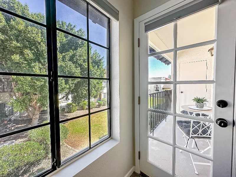 Beautiful Seating Area Off Bedroom #2
Overlooks Grassy Area / Pool Club House