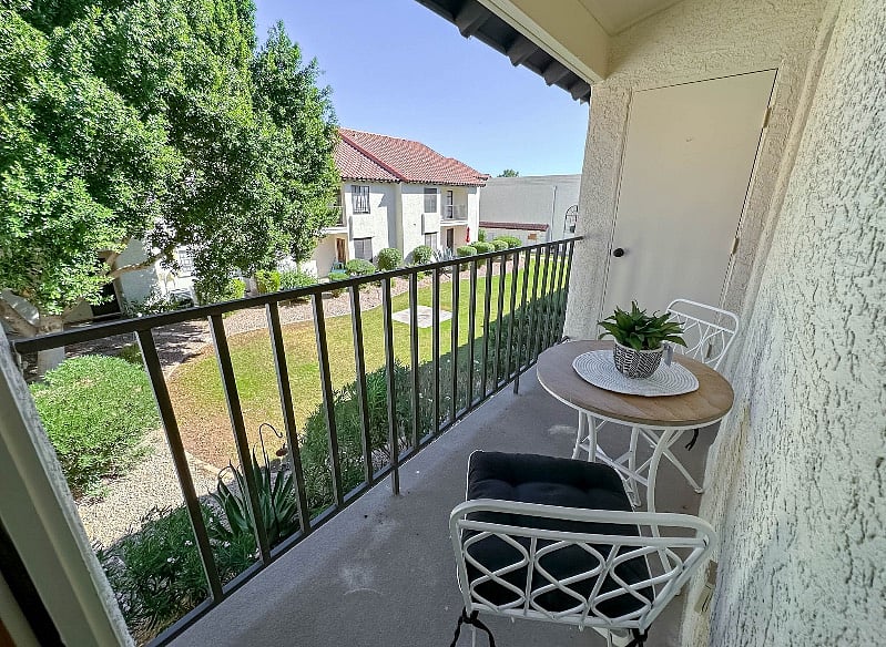 Beautiful Seating Area Off Bedroom #2
Overlooks Grassy Area / Pool Club House