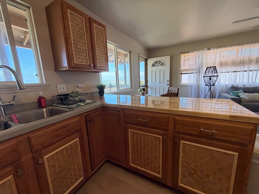 Brand new kitchen renovation.  New sink, countertops and custom cabinets!  Island Vibes!