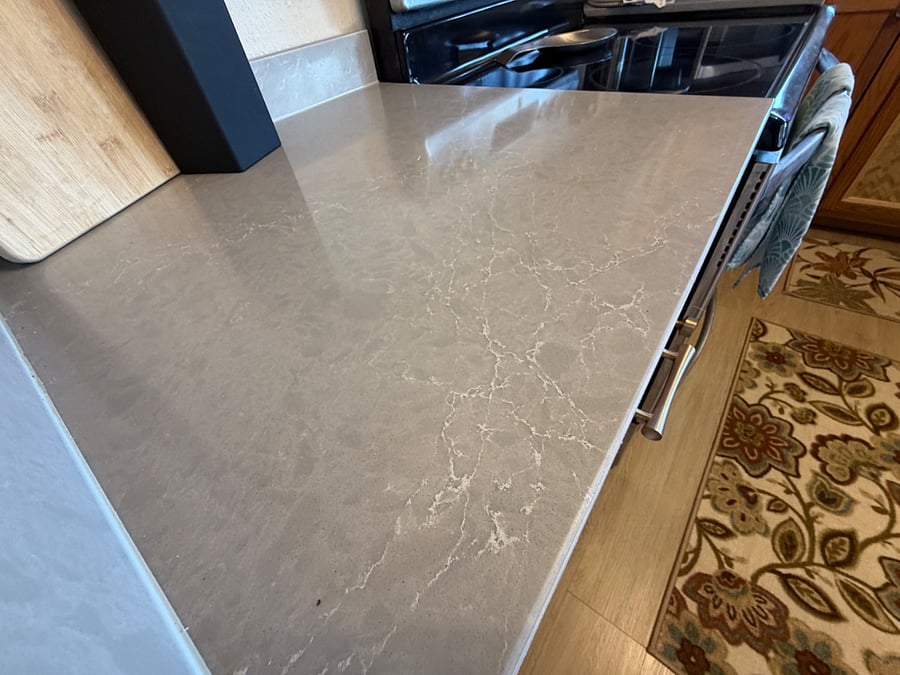 Quartz!  Brand new kitchen renovation.  New sink, countertops and custom cabinets!  Island Vibes!