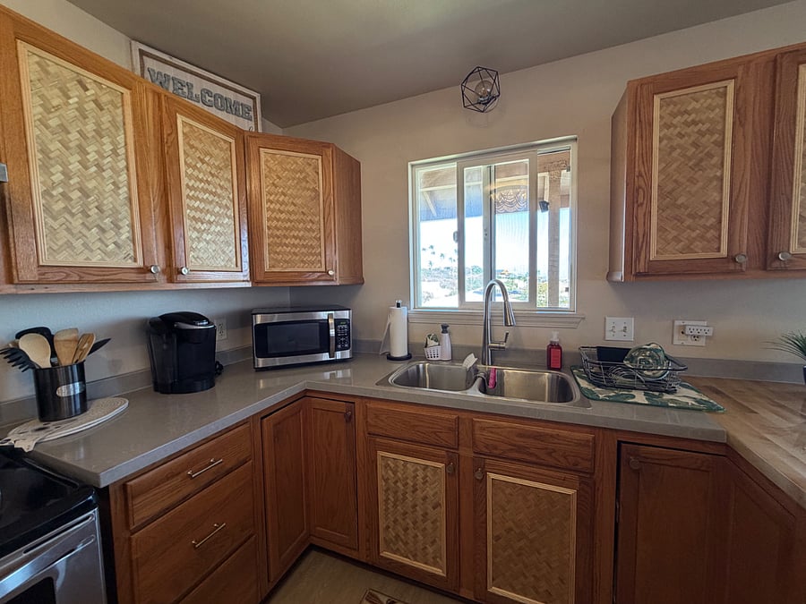 Brand new kitchen renovation.  New sink, countertops and custom cabinets!  Island Vibes!