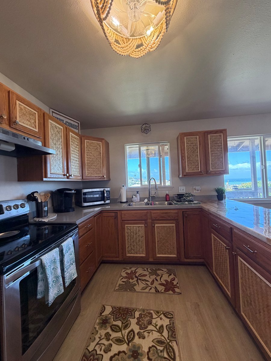 Brand new kitchen renovation.  New sink, countertops and custom cabinets!  Island Vibes!
