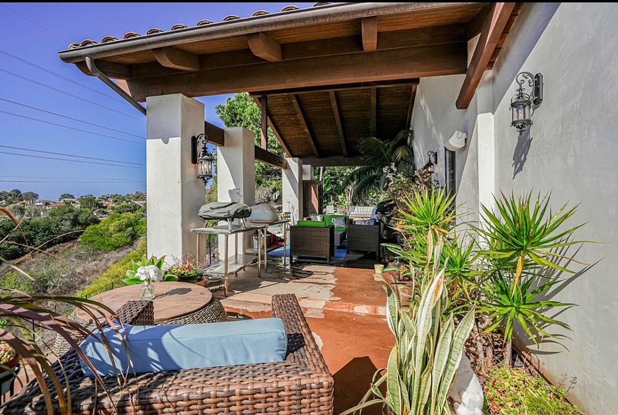 patio with BBQ and outdoor living areas