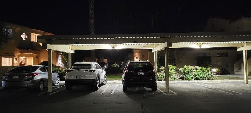 Well lit parking space with guest parking spots.