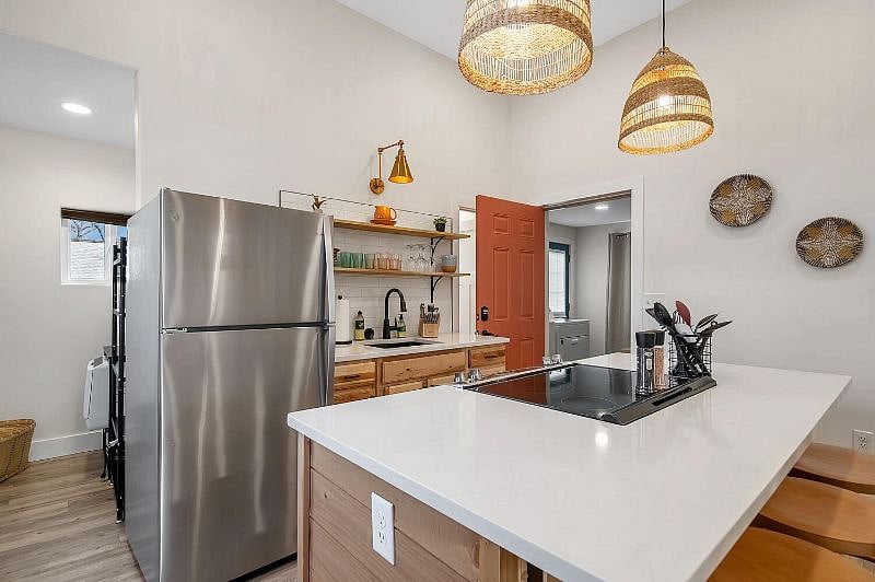 Kitchen with door to Laundry - Abode I