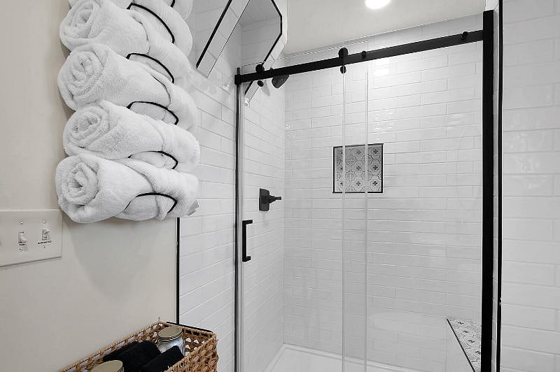 Abode I Bathroom with Walk in Shower with Bench