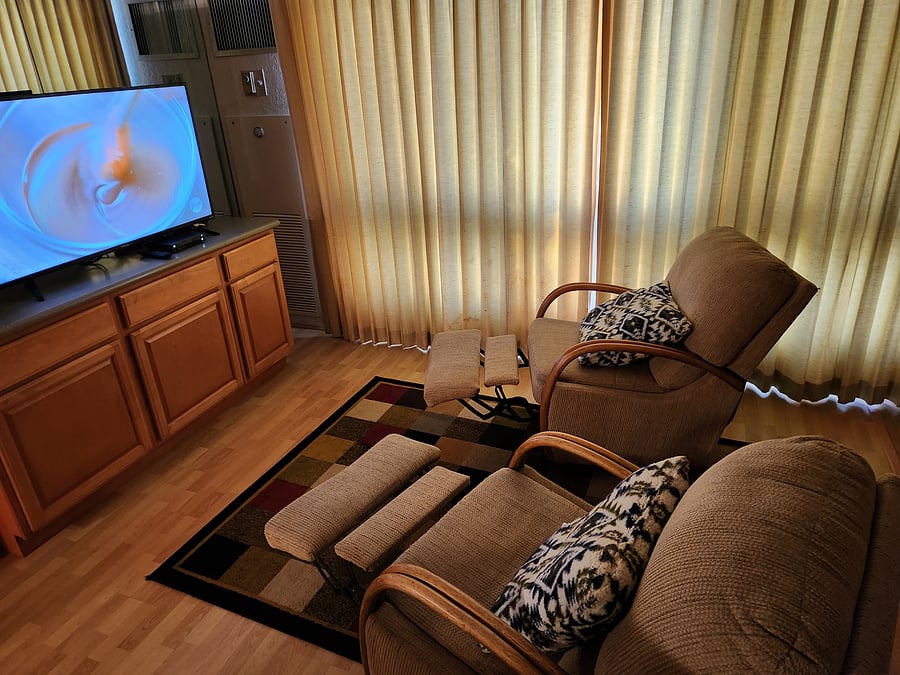 Living room with blackout curtains.