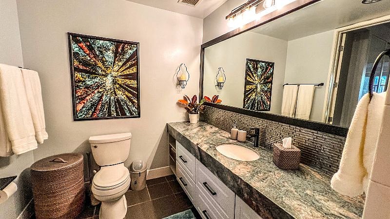 Bathroom with shower/tub, there is a second half bath as well