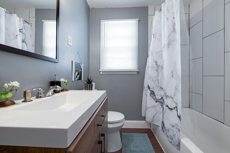 Full bathroom with bathtub shower