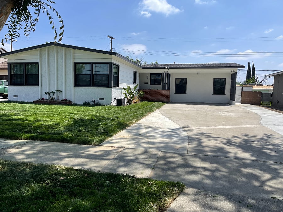Front of the house.  Please note there is a studio unit with the entrance on the right side. Although the units are attached, the units are not shared. 