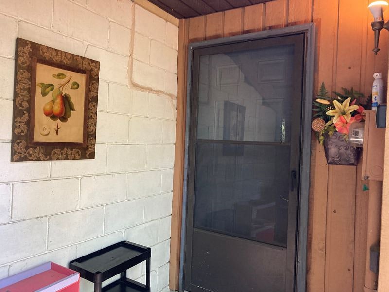 sheltered entrance with storage