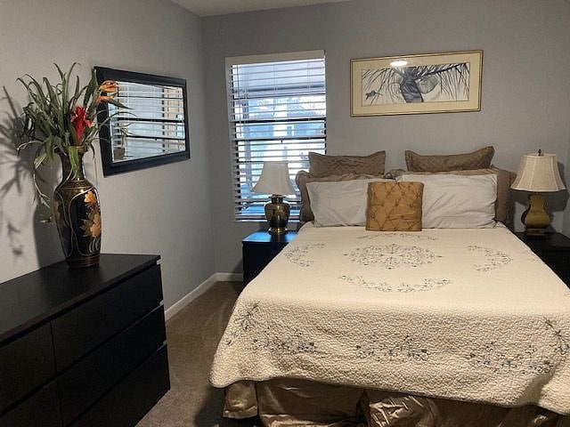 Master bedroom with new queen bed, TV, desk, (summer bedding)
