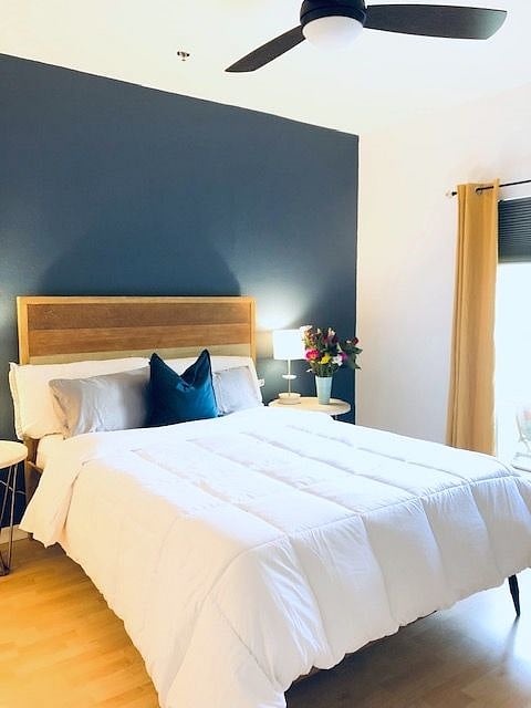 Lay your head in this wonderful room. USB ports on lamps, blackout curtains, remote control fan and fan light. Your REST inspired.