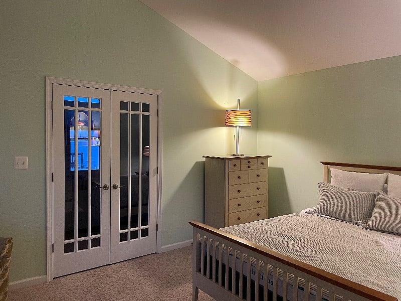 Private bedroom - doors open to living room. Water views from bedroom.