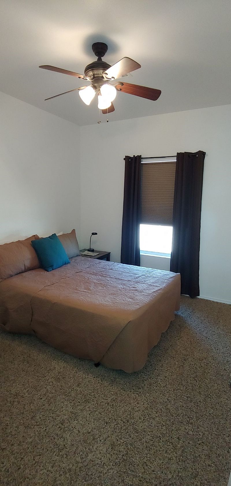 Second bedroom has a queen bed and a walk in closet