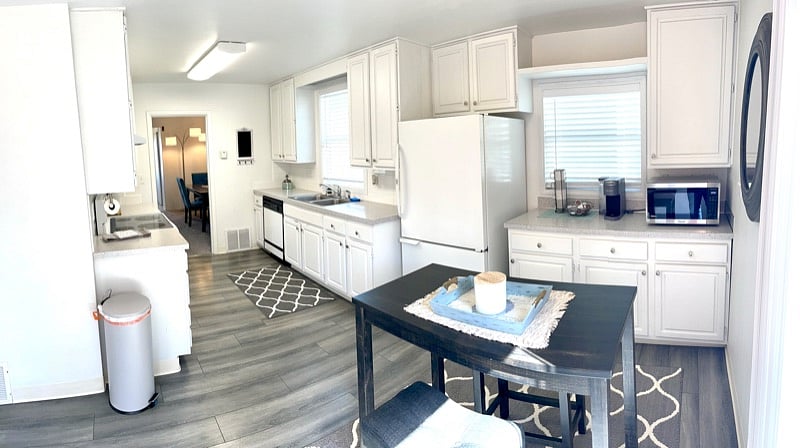 Nice Size Kitchen, Updated Vinyl Flooring and Painted Cabinets.