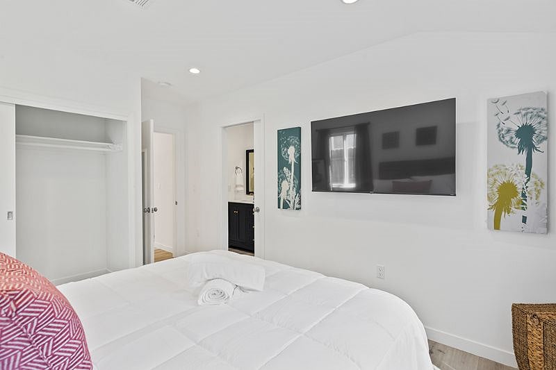 Master bedroom with 55" TV