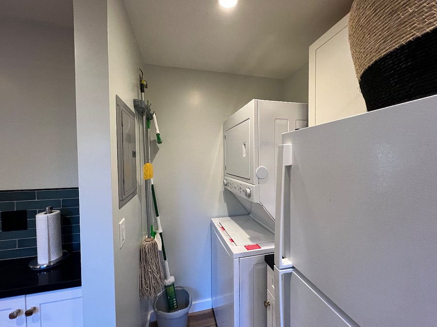 Stacked washer/dryer and utility space