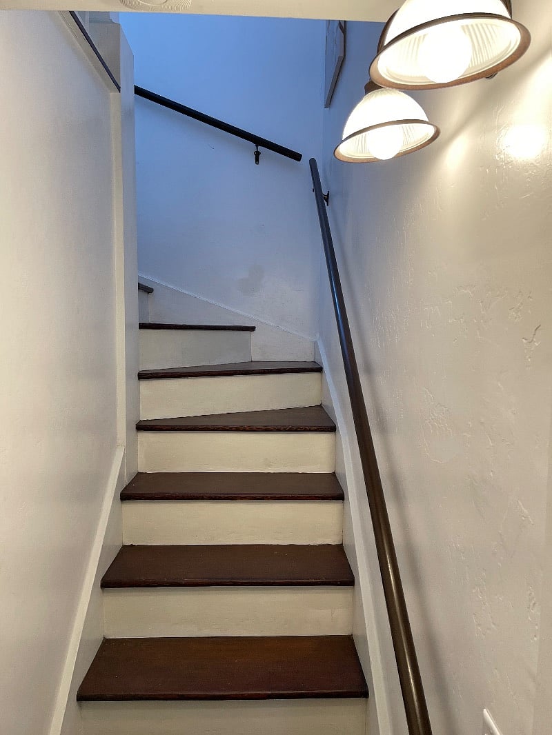 Well lit stairwell when its time to head to bed. Easy access to the bedroom and shower..