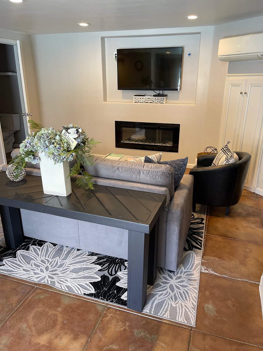 A perfect setting for two. A cozy fireplace with additional heating and cooling. Open concept to connected kitchen for a comfortable stay.