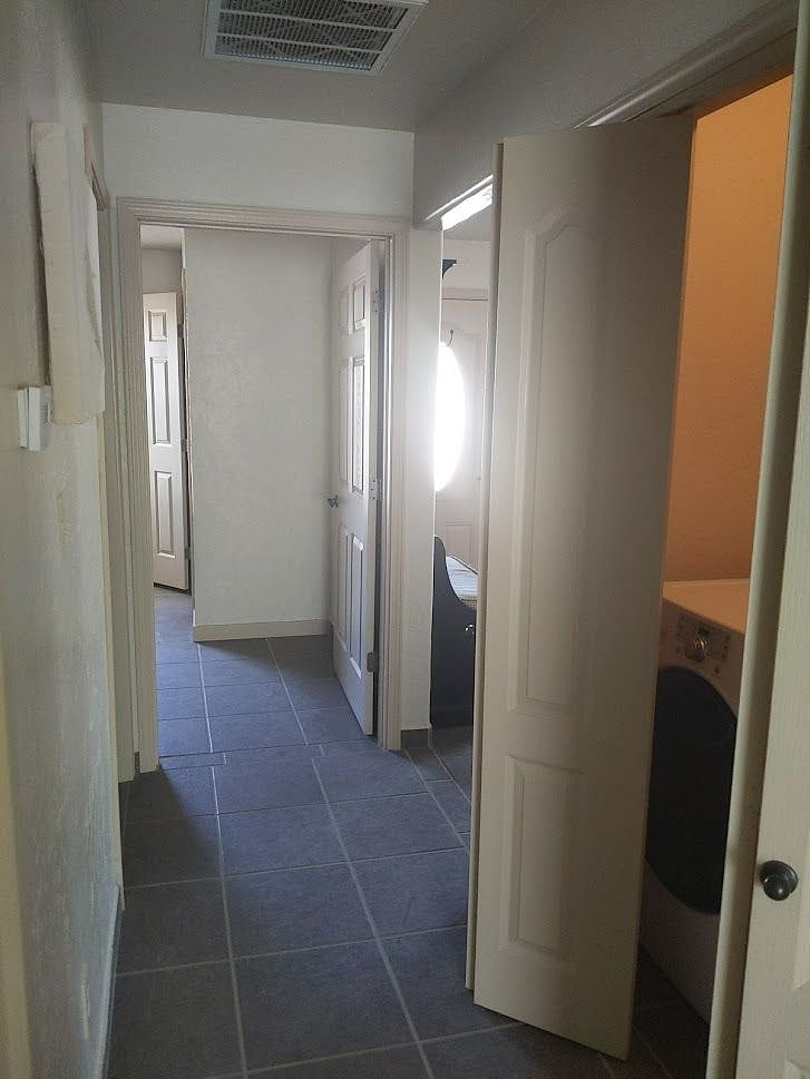 hall between bedrooms and bath