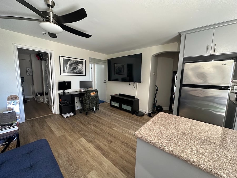 Desk and 65 inch smart tv included in furnishing
