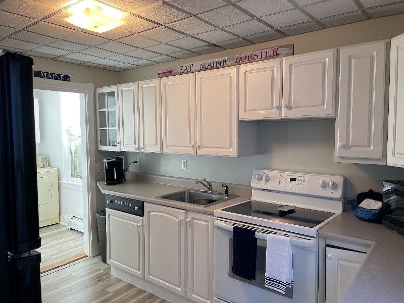 Newly renovated kitchen, ready to cook! Laundry off the kitchen.