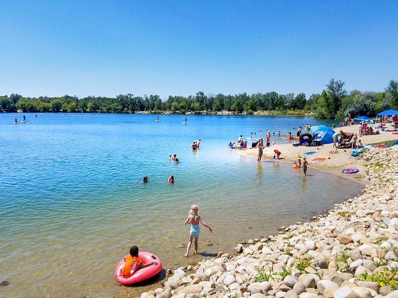 Quinn's Pond is just around the corner from the rental, perfect for paddle boarding, swimming, and other summer fun. Our house is complete with beach towels.