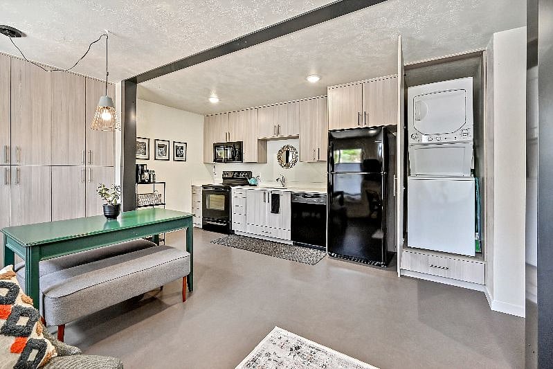 A stacking washer/dryer unit is available for your use during the stay.