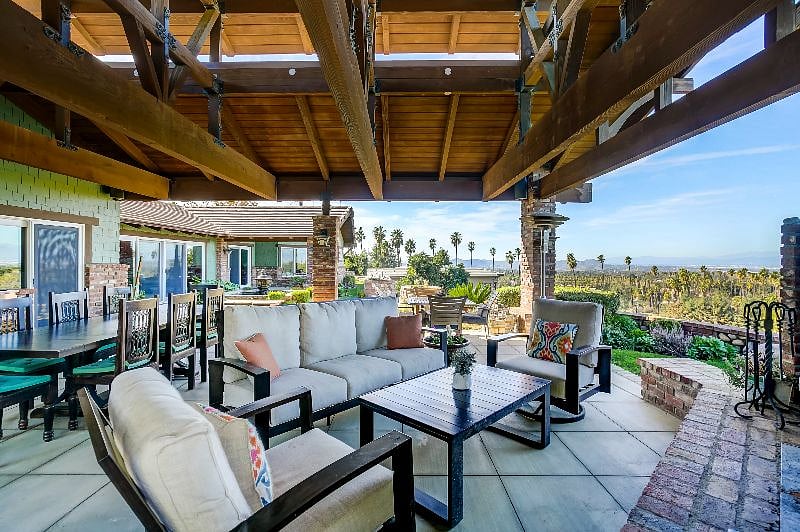 This is the upper house outdoor living room looking out from the fireplace.