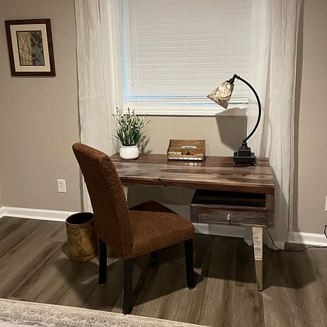 With a view to the outside, the bedroom desk provides a good place to write letters or work at your computer.