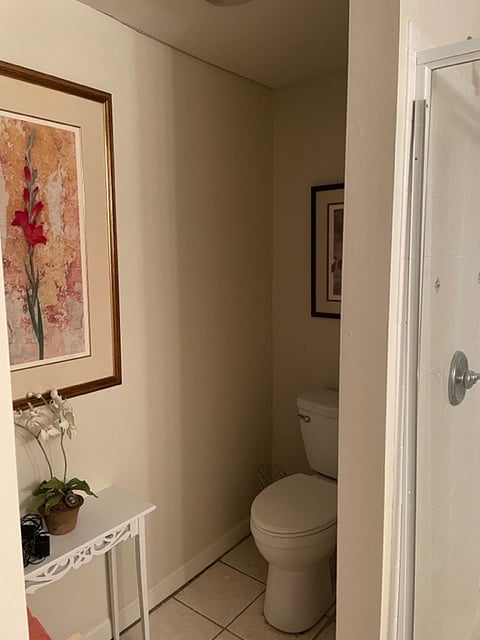 The other side of the bath has an additional storage cabinet for life's little necessities.