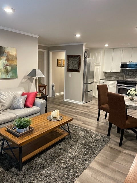 It's just a short walk down the hall to reach the bedroom, bath, and laundry room.