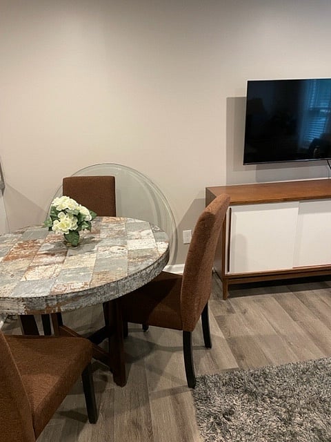 The glass is now on top of the table, making it easy to clean.