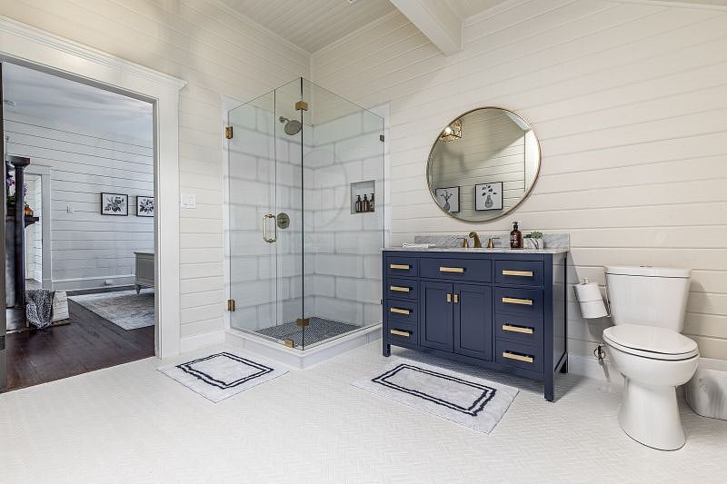 The second bathroom is newly constructed with a walk in shower.