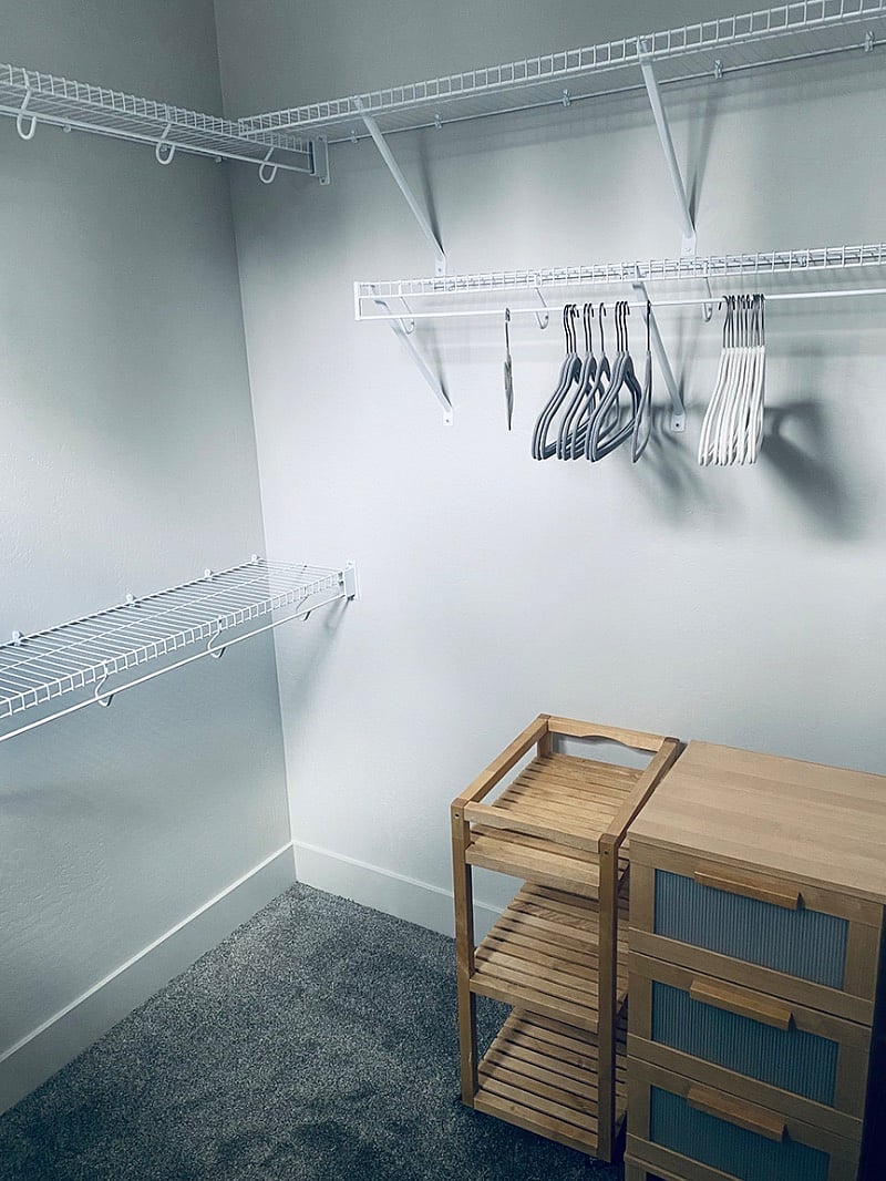 Another angle inside walk in closet, attached to room

