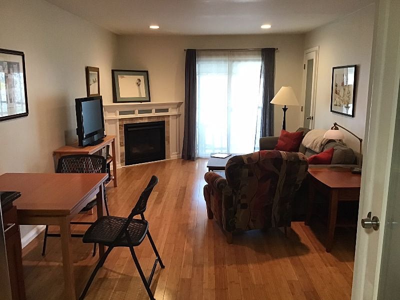 Living room showing sliders to balcony