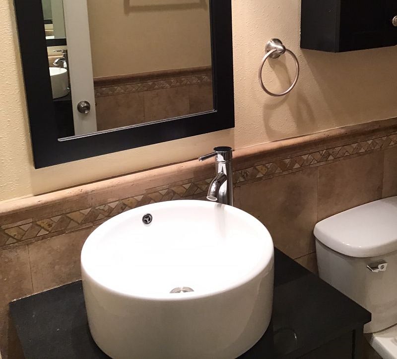 Second bathroom with tub shower
