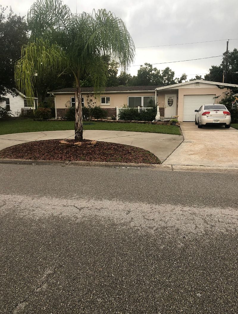 Plenty of parking. Dedicated parking on the East side (left side of cirxle driveway)