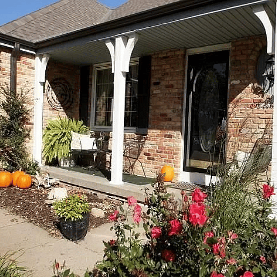 Front porch with secure touchpad door entry.