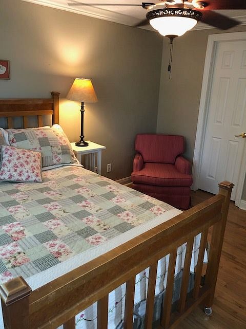 Quality bed linens and mattress, easy chair for private relaxing in your roomy bedroom.