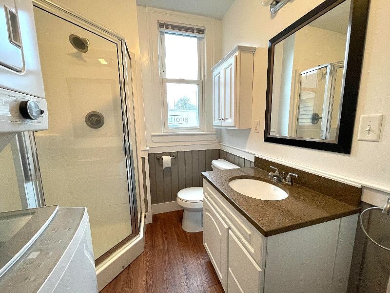Main level bathroom with washer/dryer located off dining room
