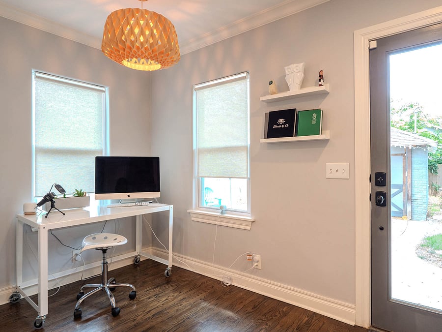 At the back of the kitchen is another workspace, as well as an iMac configured with a guest account (Note: this photo is out of date and this area is now a reading/coffee nook).
