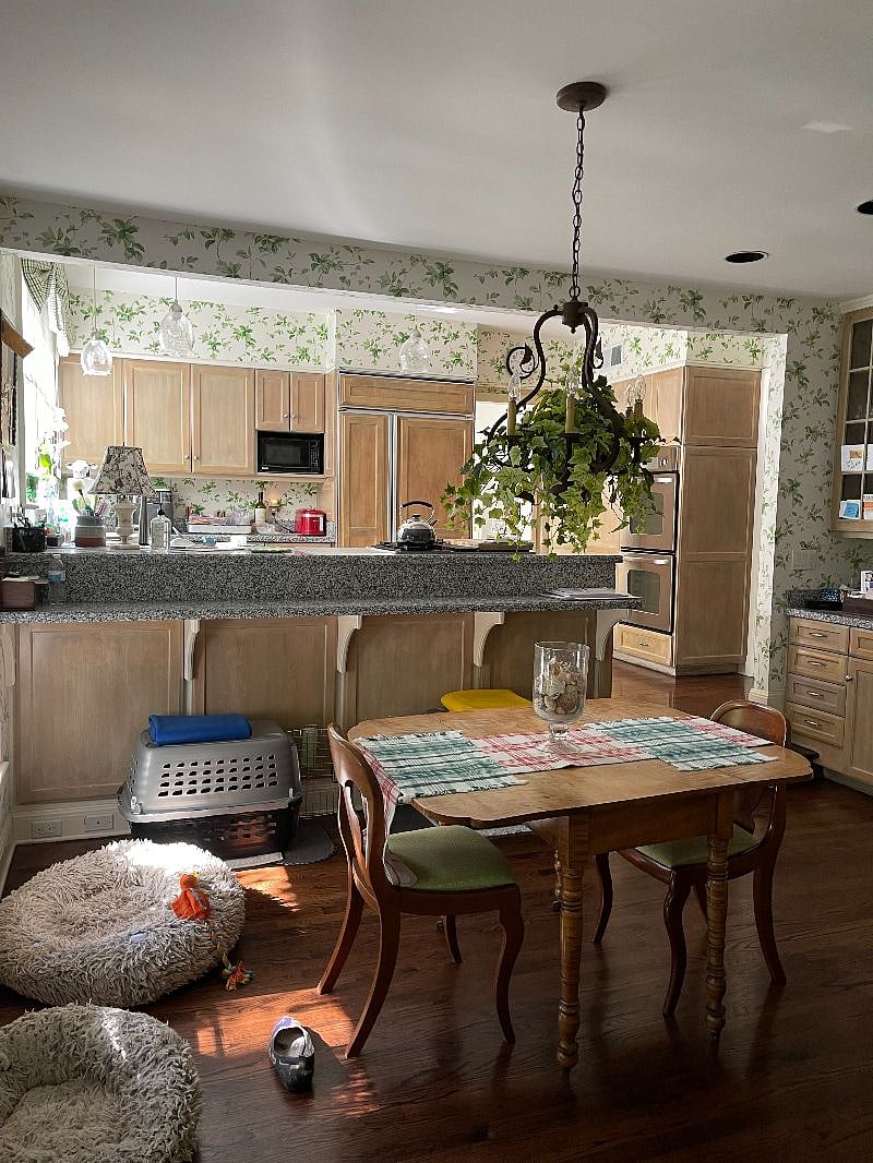 Enter the kitchen from the garage to access the staircase