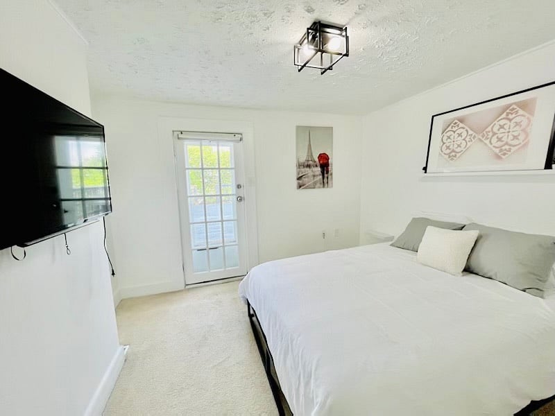 Bedroom 1 with door that leads onto the deck.