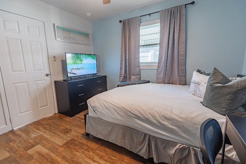 Smart TV (Fire TV) and 100% blackout curtains.