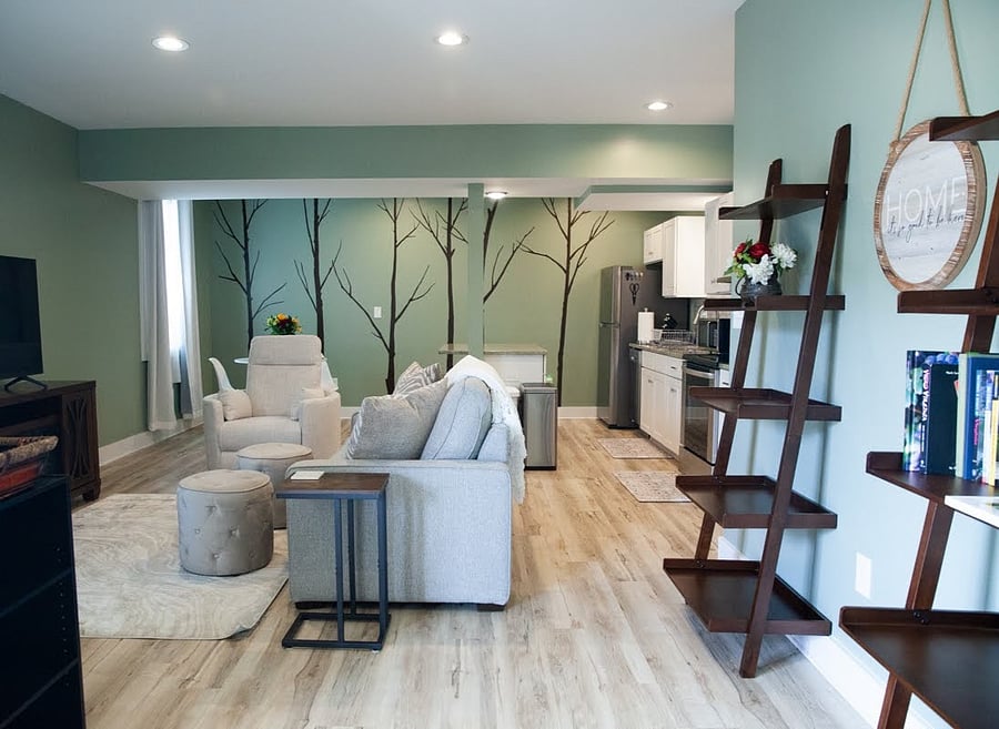 View of the open concept living area standing just inside the private entrance
