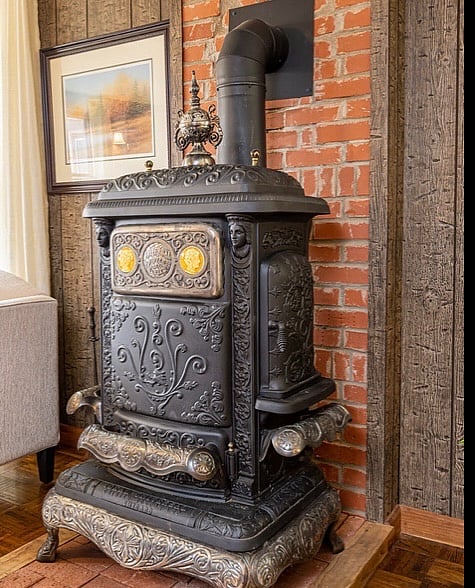 Wood burning furnace. Not for use unless needed, but antique and beautiful to be around.